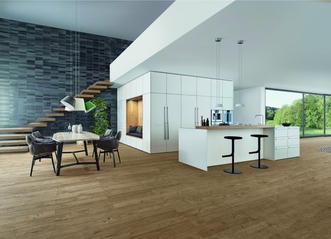 Design keuken met kookeiland van Leicht, perfect geïntegreerd in een luxe woonkamer